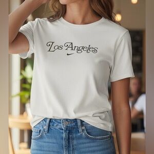 Nike Women's Sportswear Los Angeles Logo T-Shirt color off white size medium